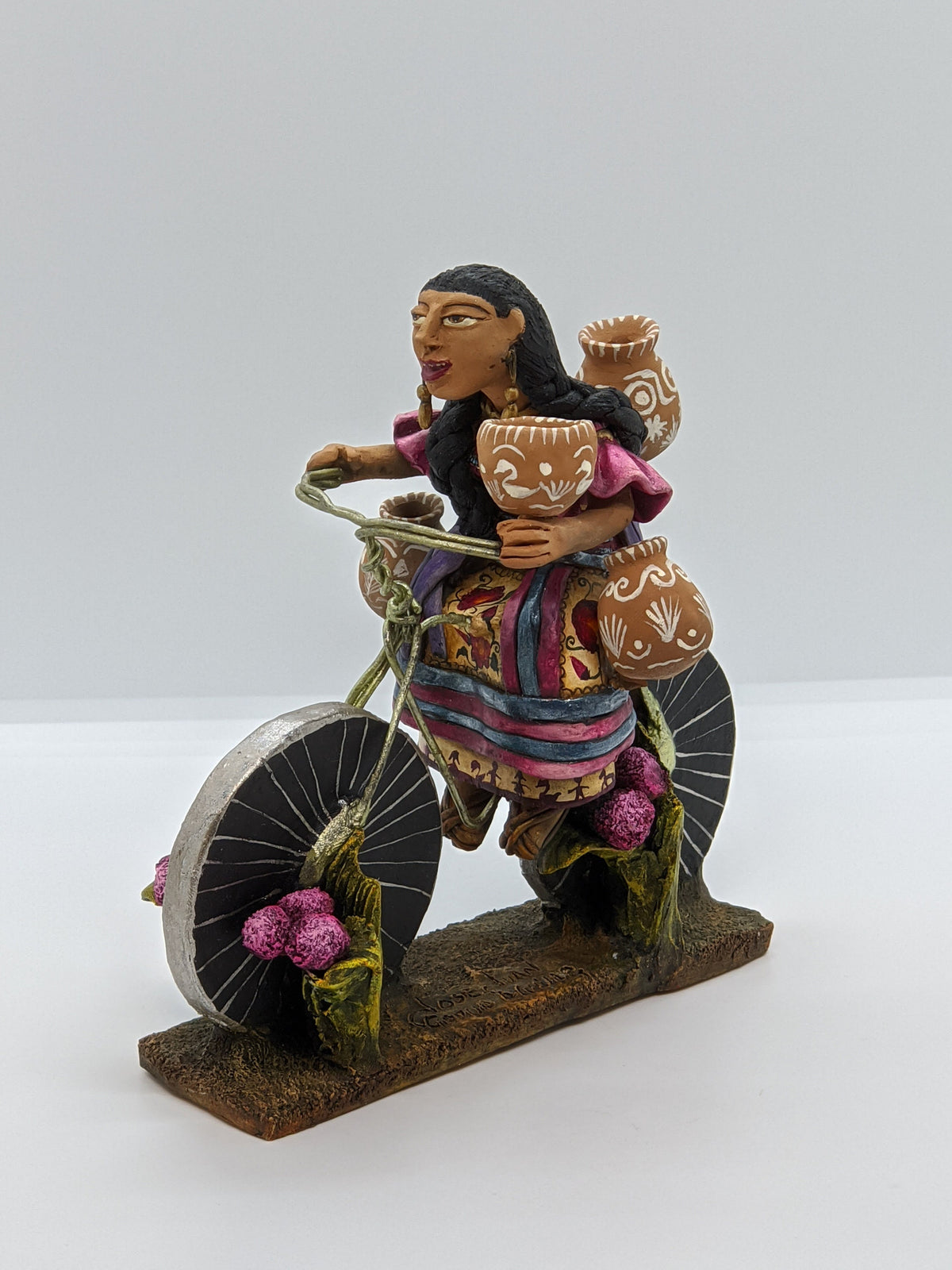 Woman on Bicycle, Handcrafted Mexican Folk Art in Clay from Oaxaca