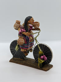 Woman on Bicycle, Handcrafted Mexican Folk Art in Clay from Oaxaca