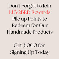 Promotional text for LUV2BRD Rewards program on a beige background