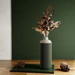 The Serenity Vase is an excellent choice for those who appreciate both plant life and contemporary design. Crafted from sustainably sourced wood, this vase is perfect for showcasing dried or fresh flowers and adds a unique touch to any living space.